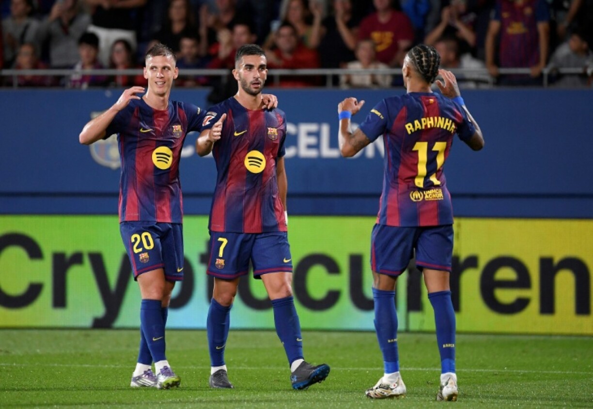 Barcelona's Spanish forward Ferran Torres (C) opened the scoring with a powerful finish at the end of a slick move