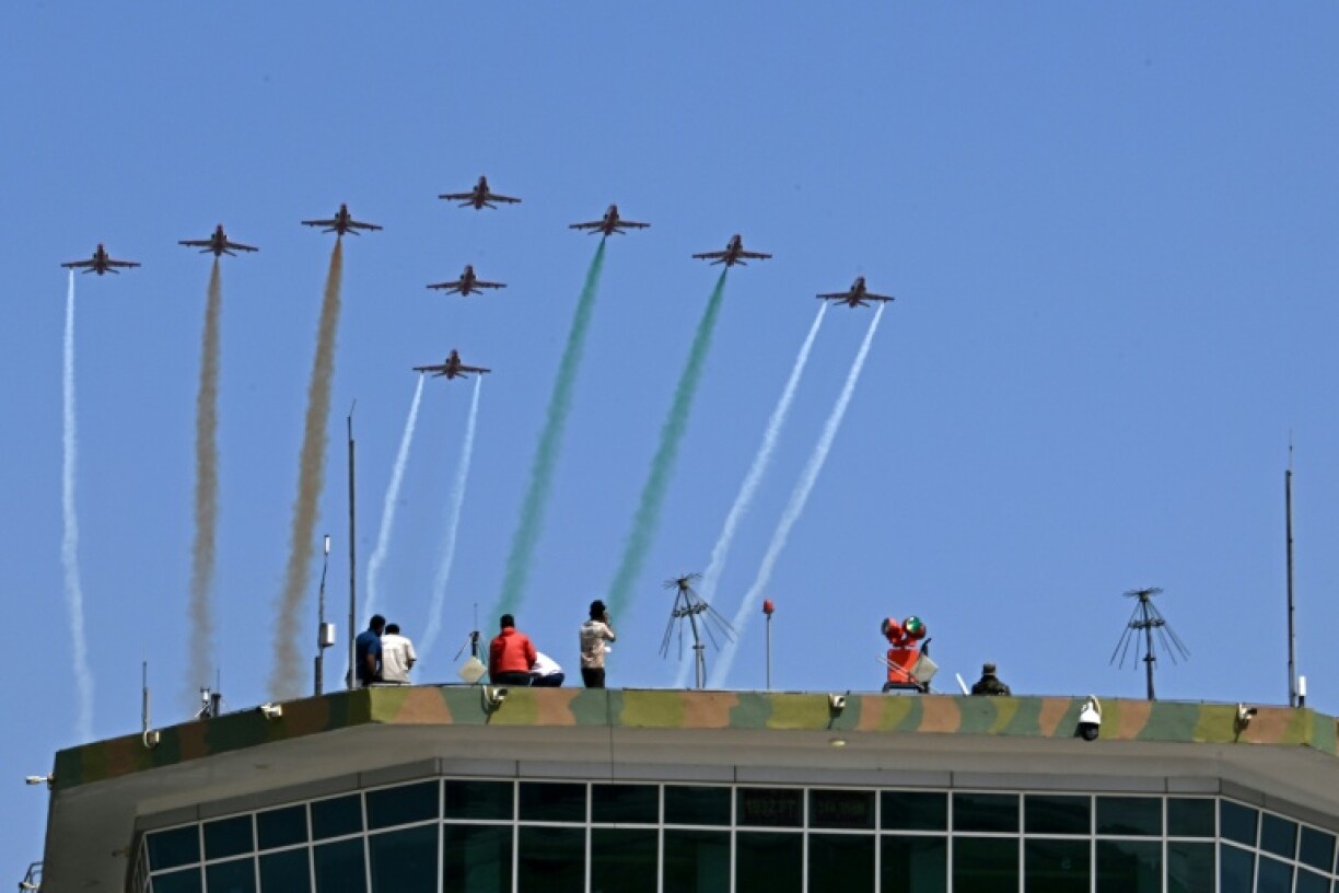 Indian Air Force Surya Kiran aerobatics team perform a flypast during rehearsal ahead of MIG-21 Bison fighter jet farewell ceremony at Chandigarh Airforce Station