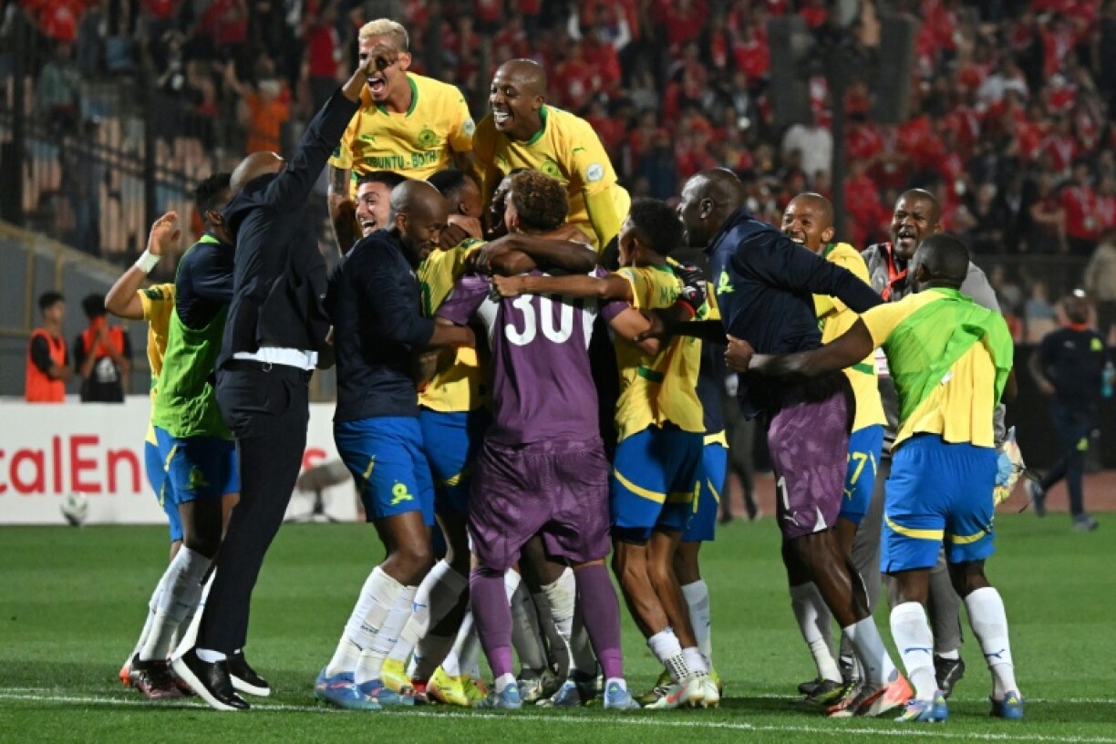 Mamelodi Sundowns celebrate in Cairo after reaching the CAF Champions League final.