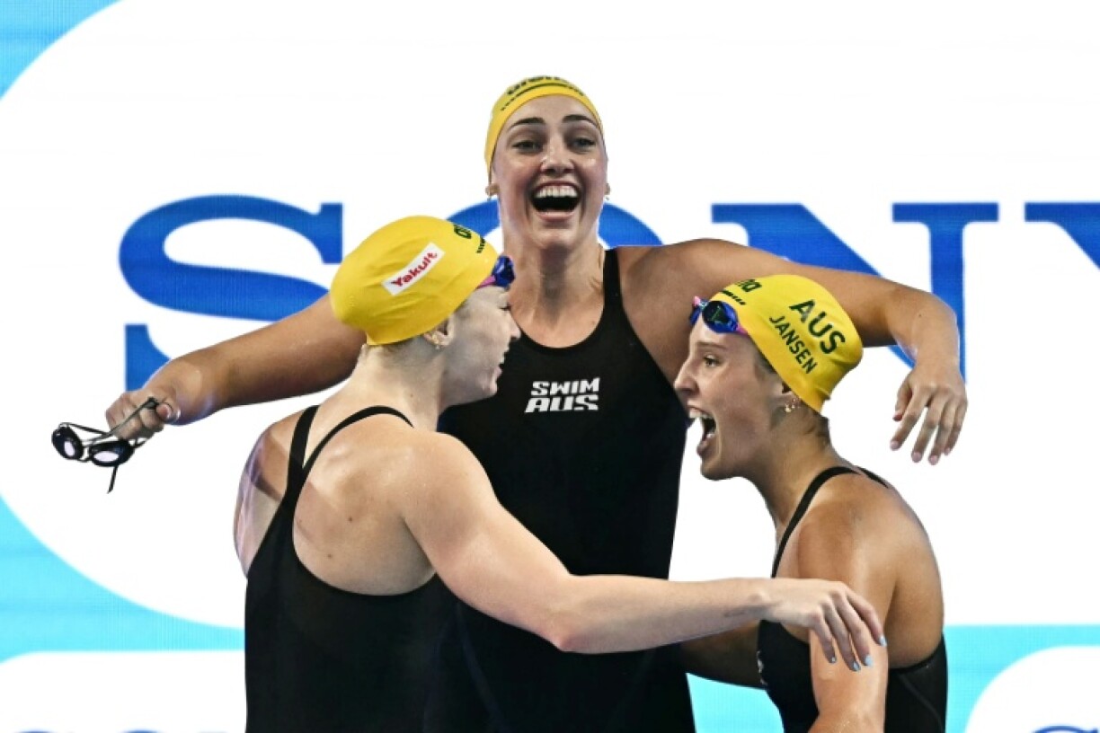 Australia celebrate winning the final of the women's 4x100m freestyle relay