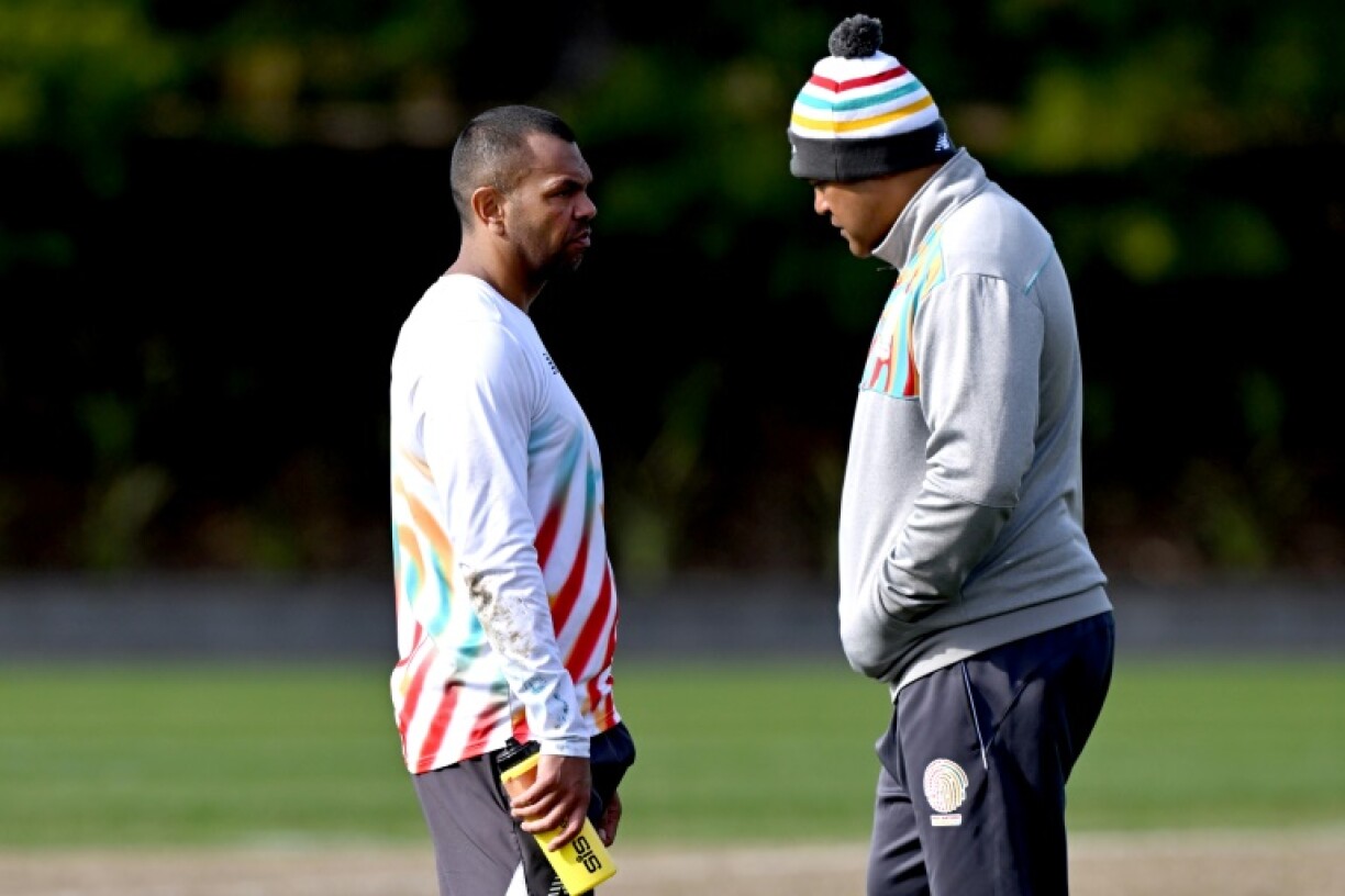 First Nations & Pasifika XV captain Kurtley Beale (left) speaks to coach Toutai Kefu during a training session in Melbourne