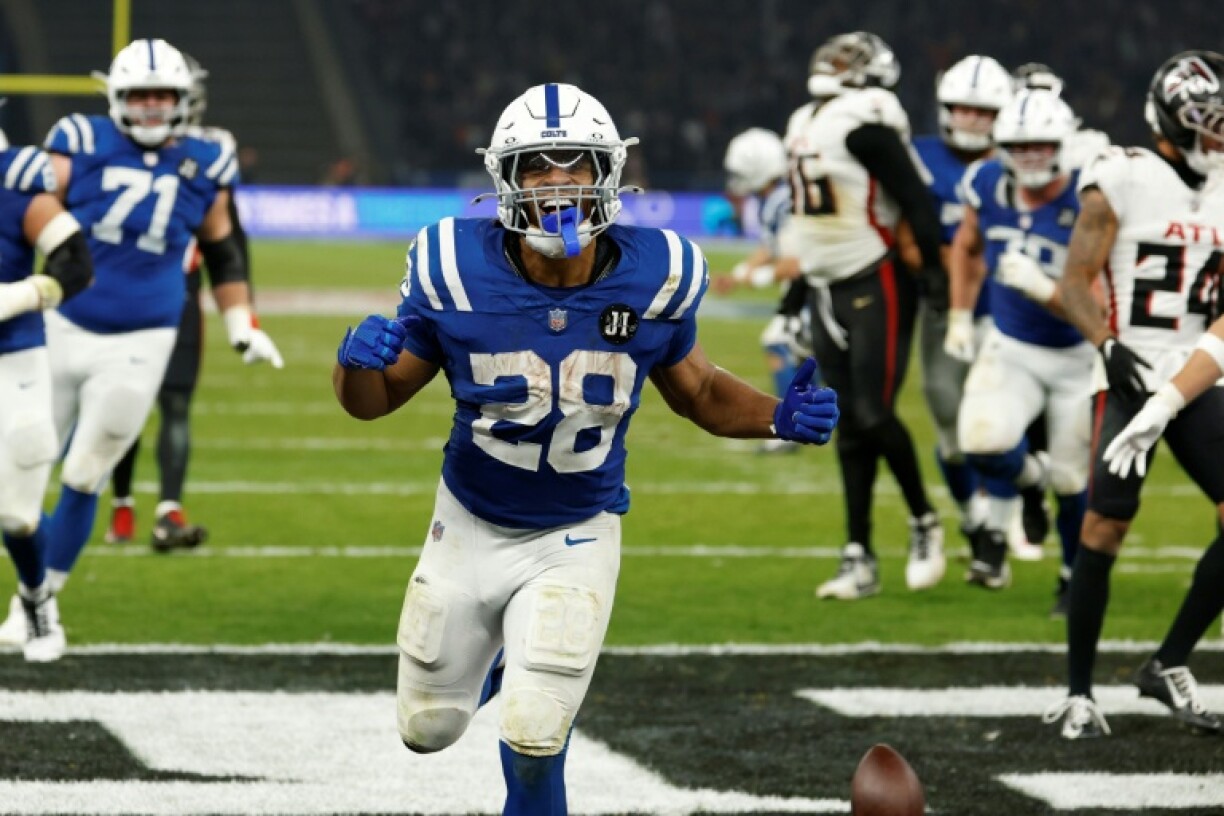 Indianapolis running back Jonathan Taylor celebrates scoring the winning touchdown in overtime to give the Colts an NFL victory over Atlanta at Berlin Olympic Stadium