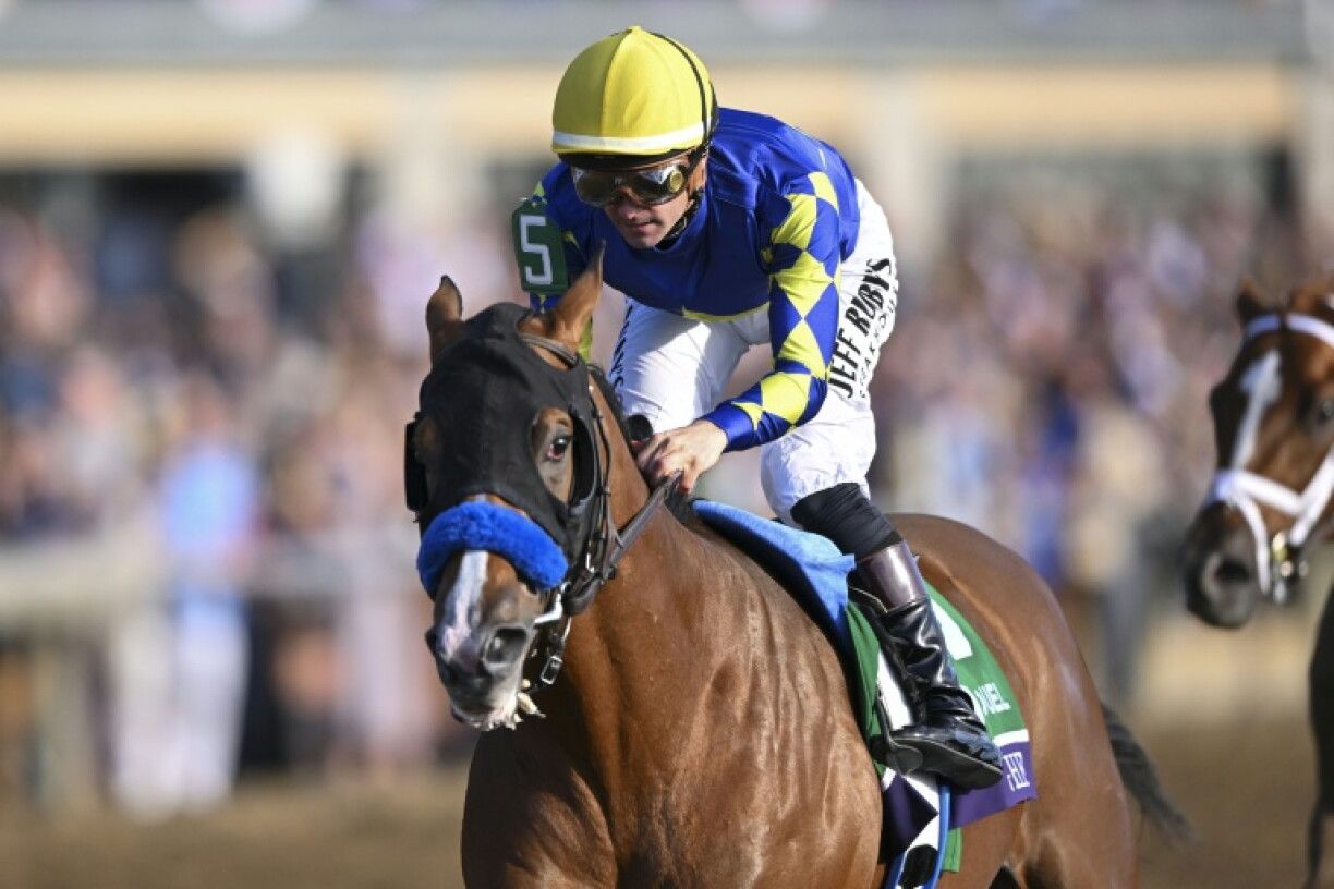 Hughes, ridden by Flavien Prat, wins the Breeders' Cup Juvenile at Keeneland