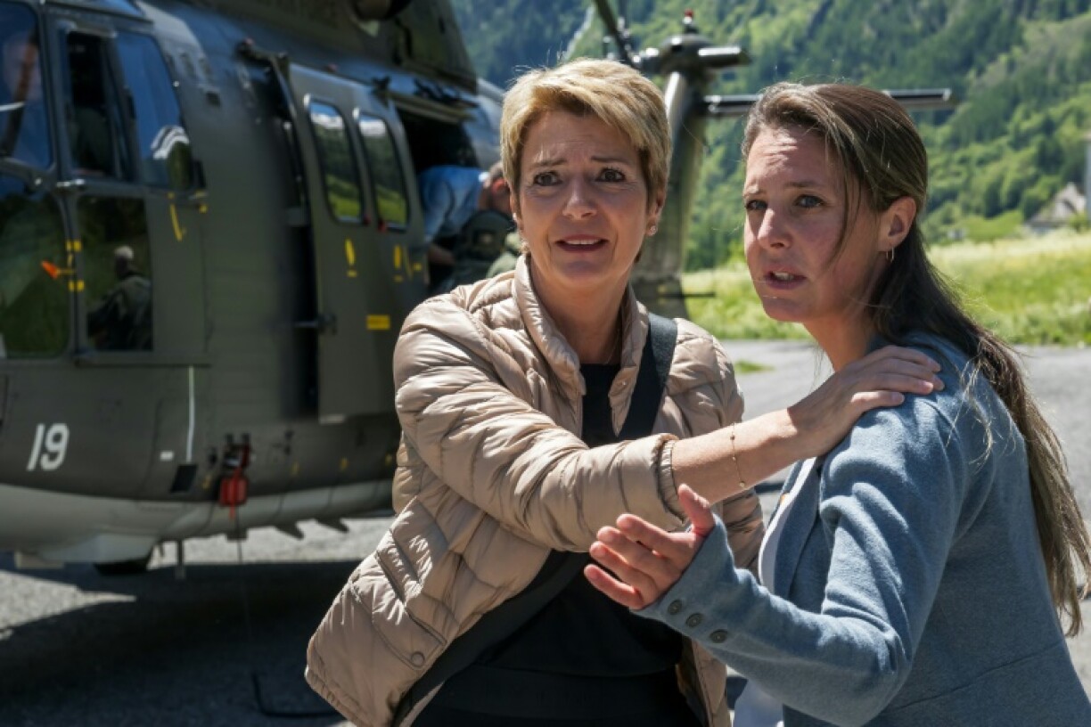 Swiss President Karin Keller-Sutter (L) visited the disaster area