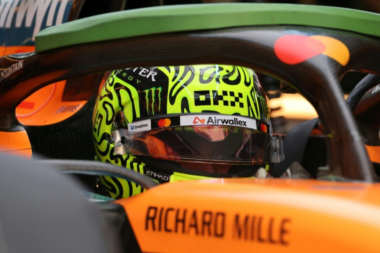 McLaren's British driver Lando Norris sits in his car in the pit lane at the Bahrain Grand Prix in Malaysia last week
