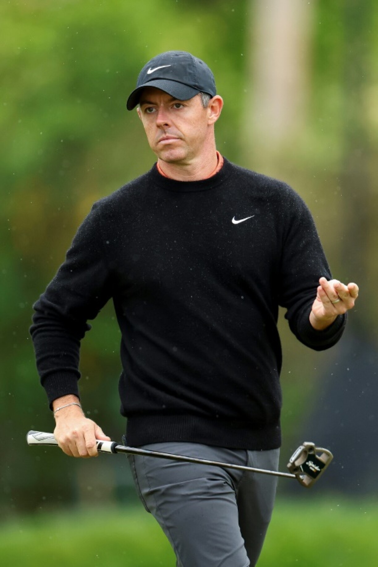 Defending champion Rory McIlroy of Northern Ireland fired a second-round 67 to stay five strokes off the lead at the PGA Truist Championship