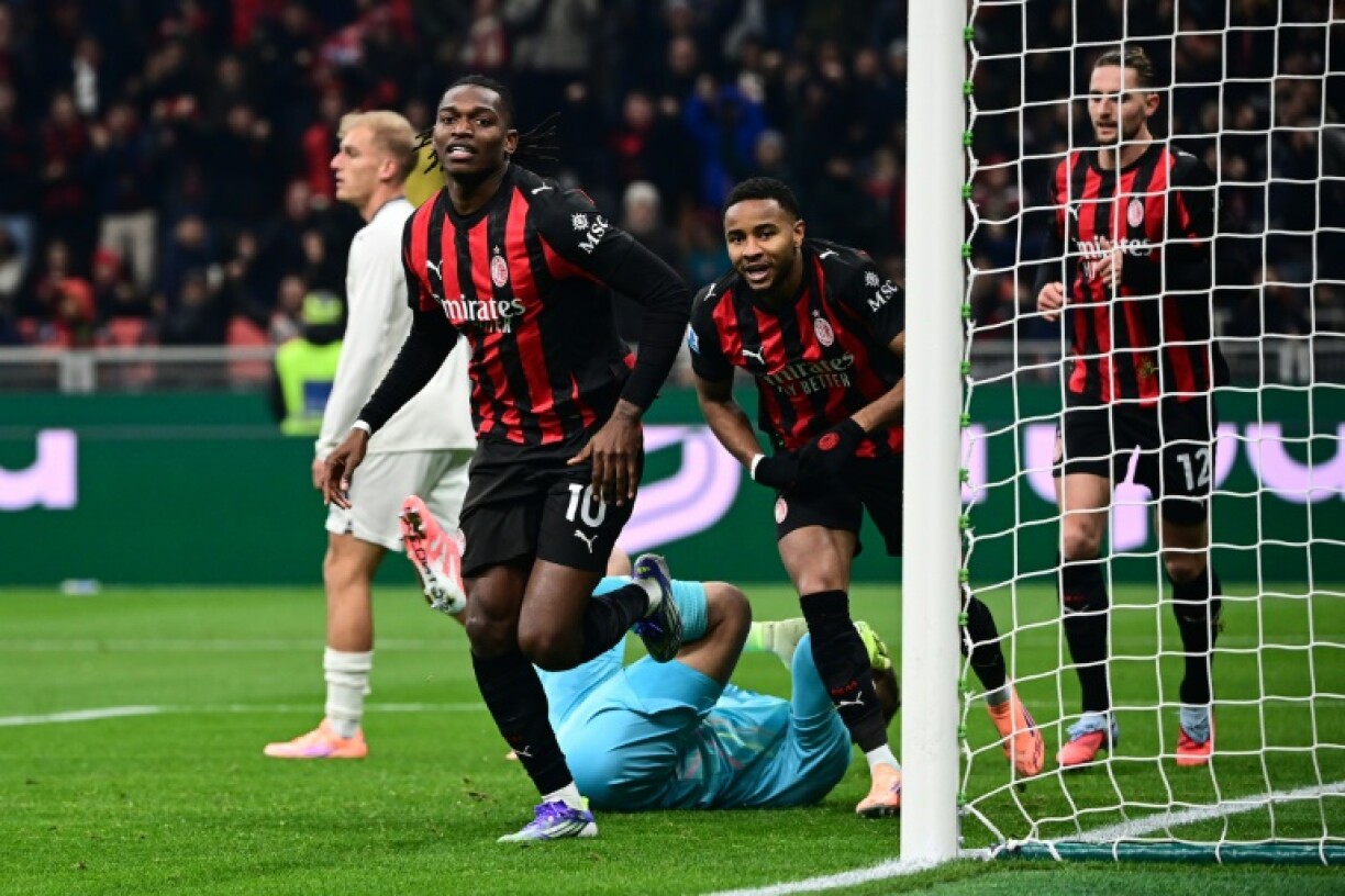 Rafael Leao (L) forced home the only goal of a scrappy game at the San Siro