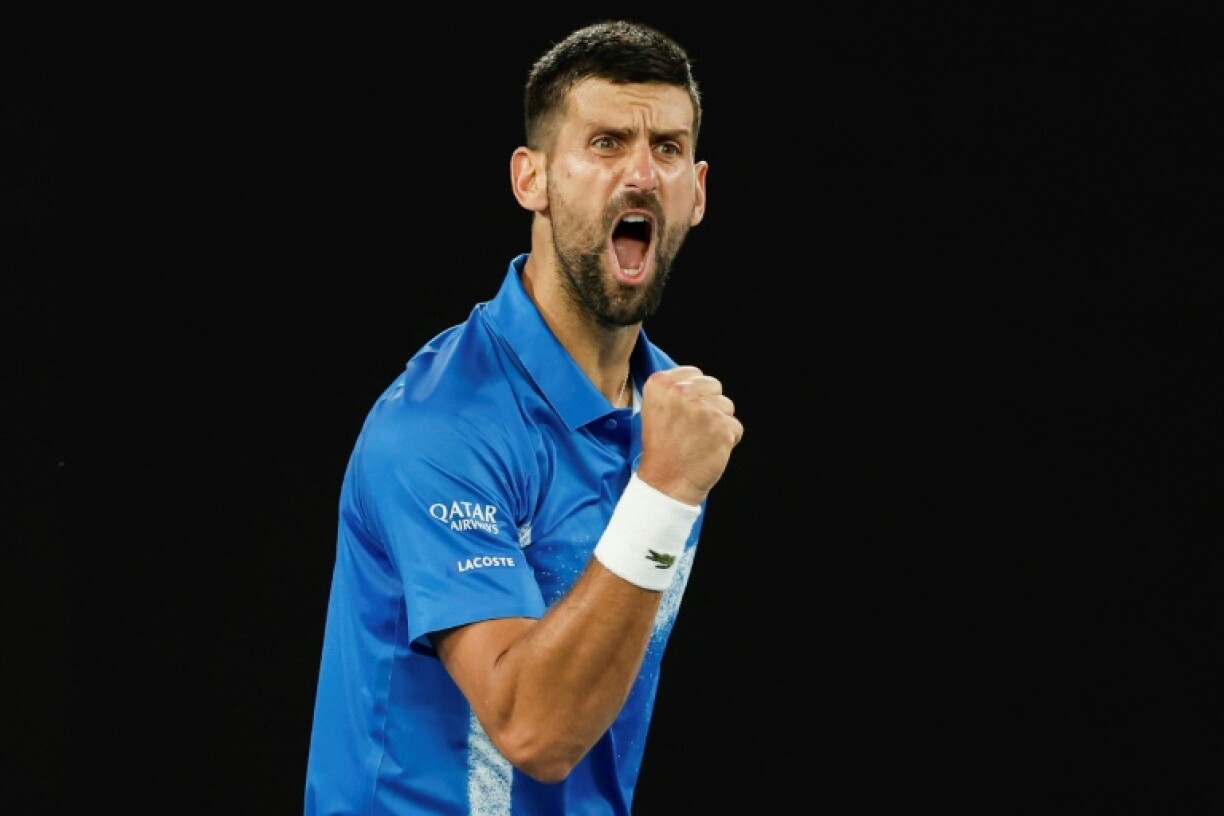 Novak Djokovic reacts after a point against Czech Republic's Tomas Machac