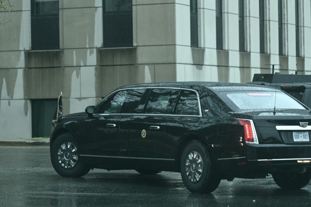 The presidential motorcade stands outside of Walter Reed Army Medical Center, after US President Donald Trump entered the building for his annual physical, in Bethesda, Maryland