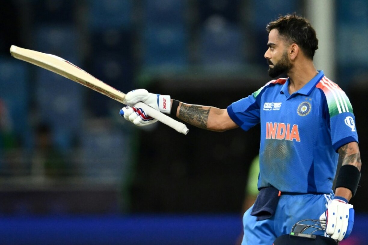 King Kohli: The India superstar celebrates scoring his century