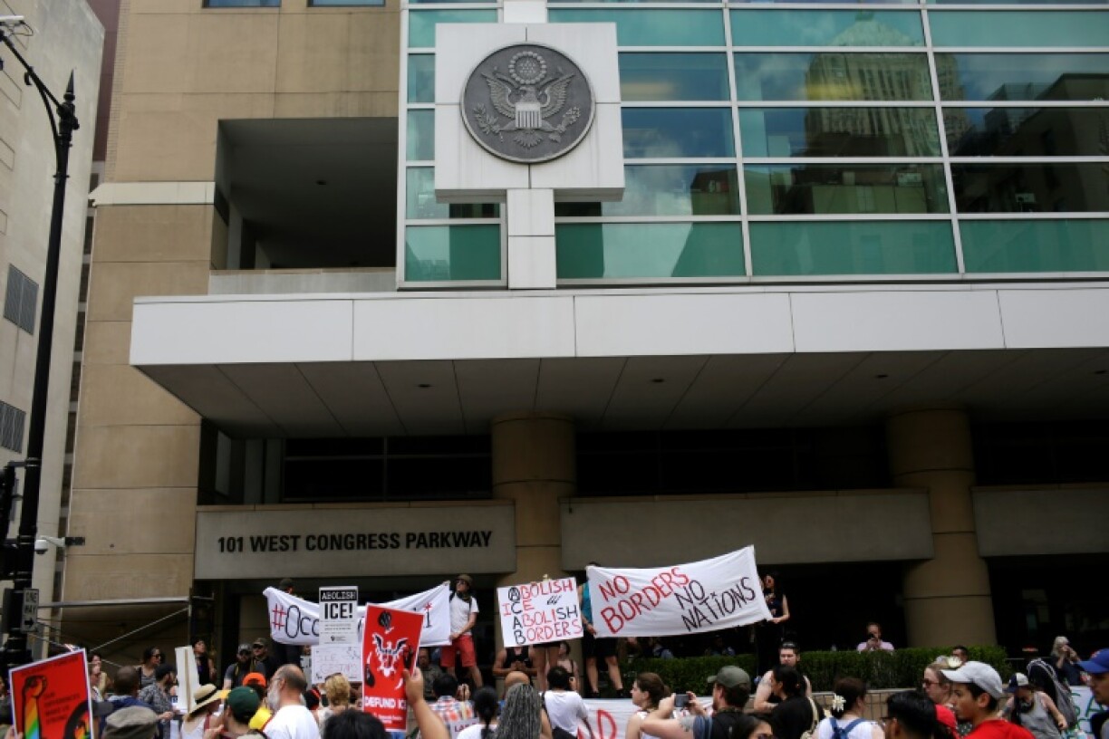 People protest against US Immigration and Customs Enforcement and the first Trump administration's immigration policies outside a Chicago ICE office in 2018