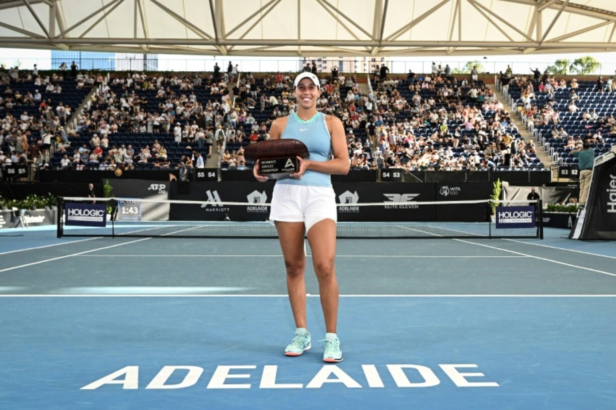 Madison Keys holds the winner's trophy after her victory against American compatriot Jessica Pegula at the Adelaide International final