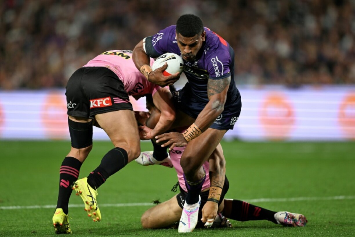 Eli Katoa (right) has been moved out of intensive care four days after requiring surgery following