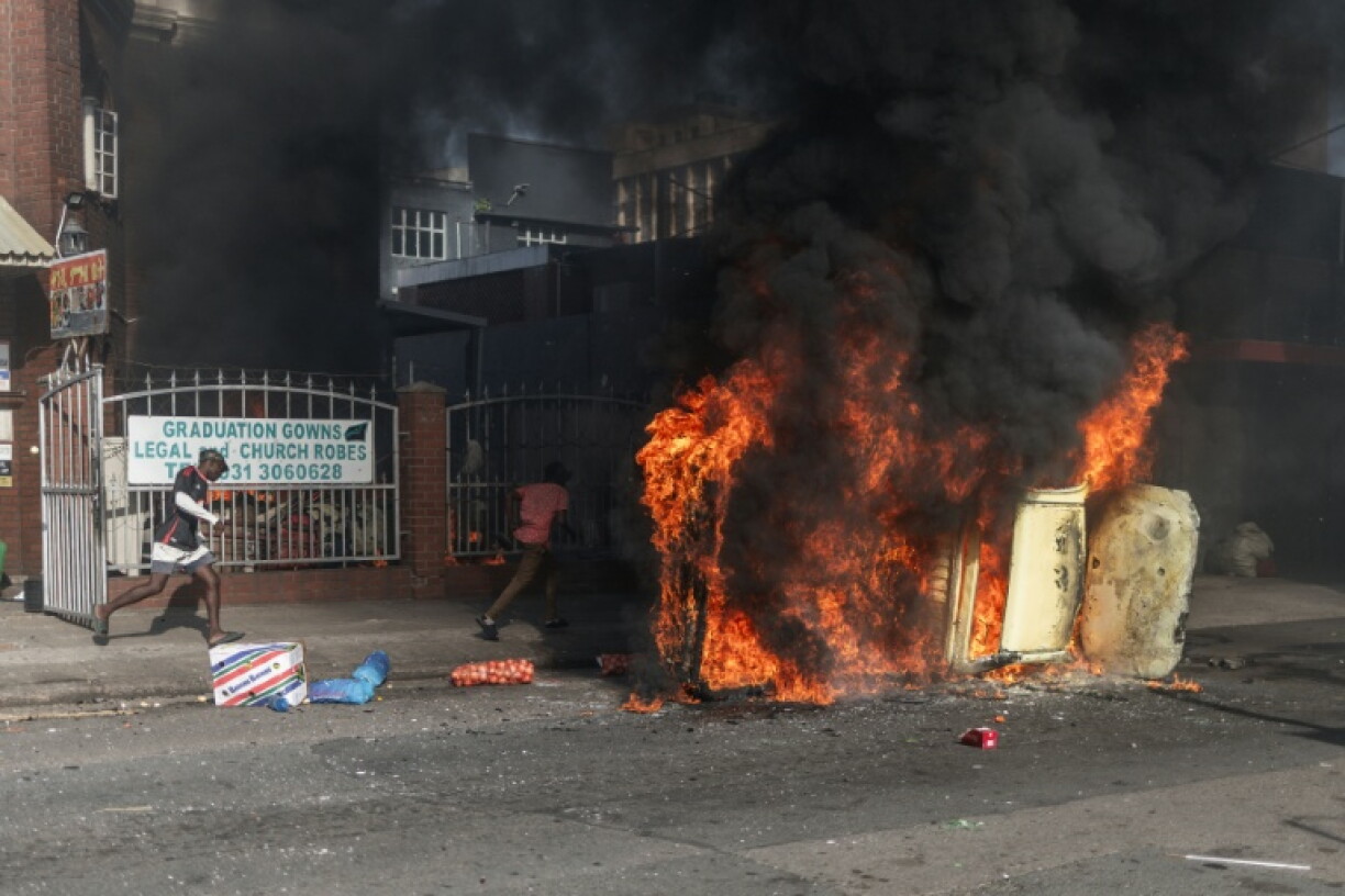 Several cars were torched in Durban after clashes erupted between protesters and foreign nationals
