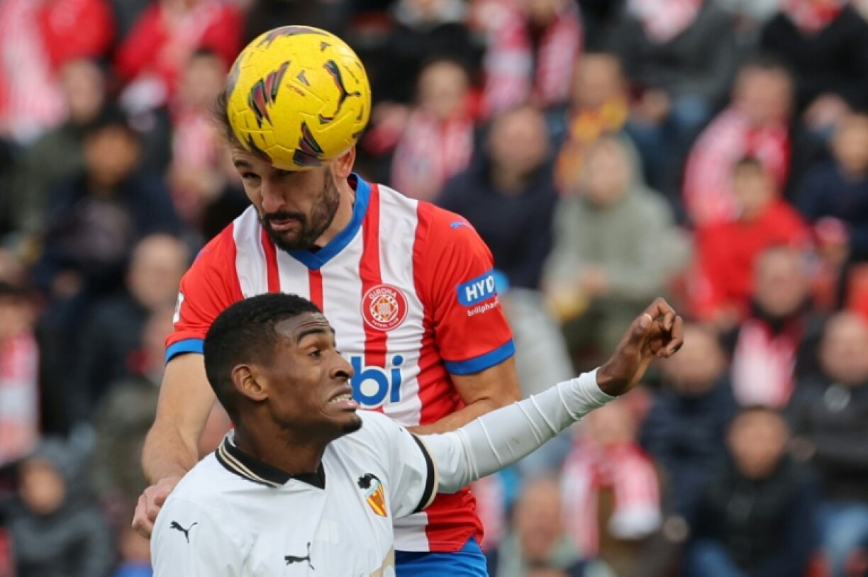 Cristhian Mosquera (below) in action for Valencia