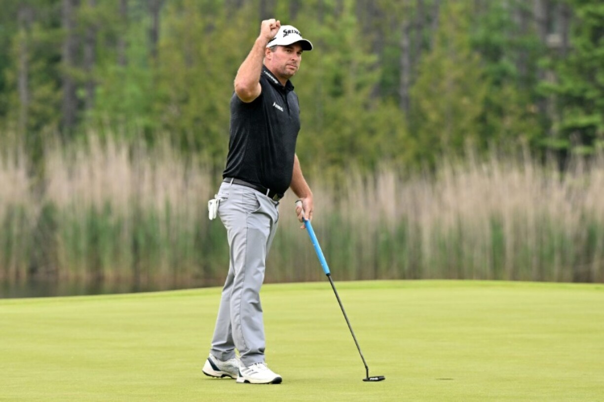 New Zealand's Ryan Fox celebrates his winning putt after beating Sam Burns on the fourth playoff hole to capture the US PGA Tour's Canadian Open