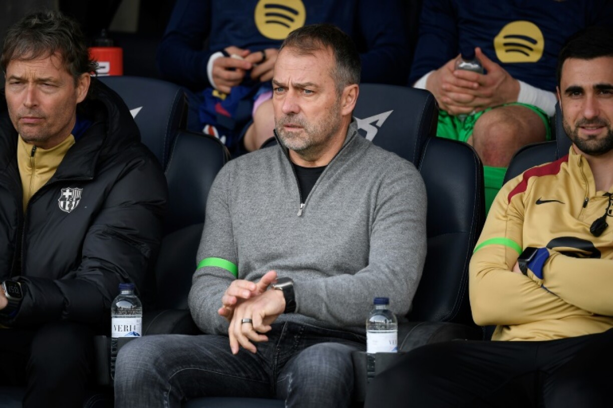 Barcelona coach Hansi Flick (C) said his team would not hide behind excuses and complaints this season