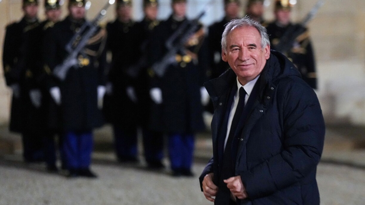 Prime Minister Francois Bayrou arrives at the presidential Elysee Palace for an official state dinner as part of the president of Angola's state visit to France, in Paris, on 16 January.