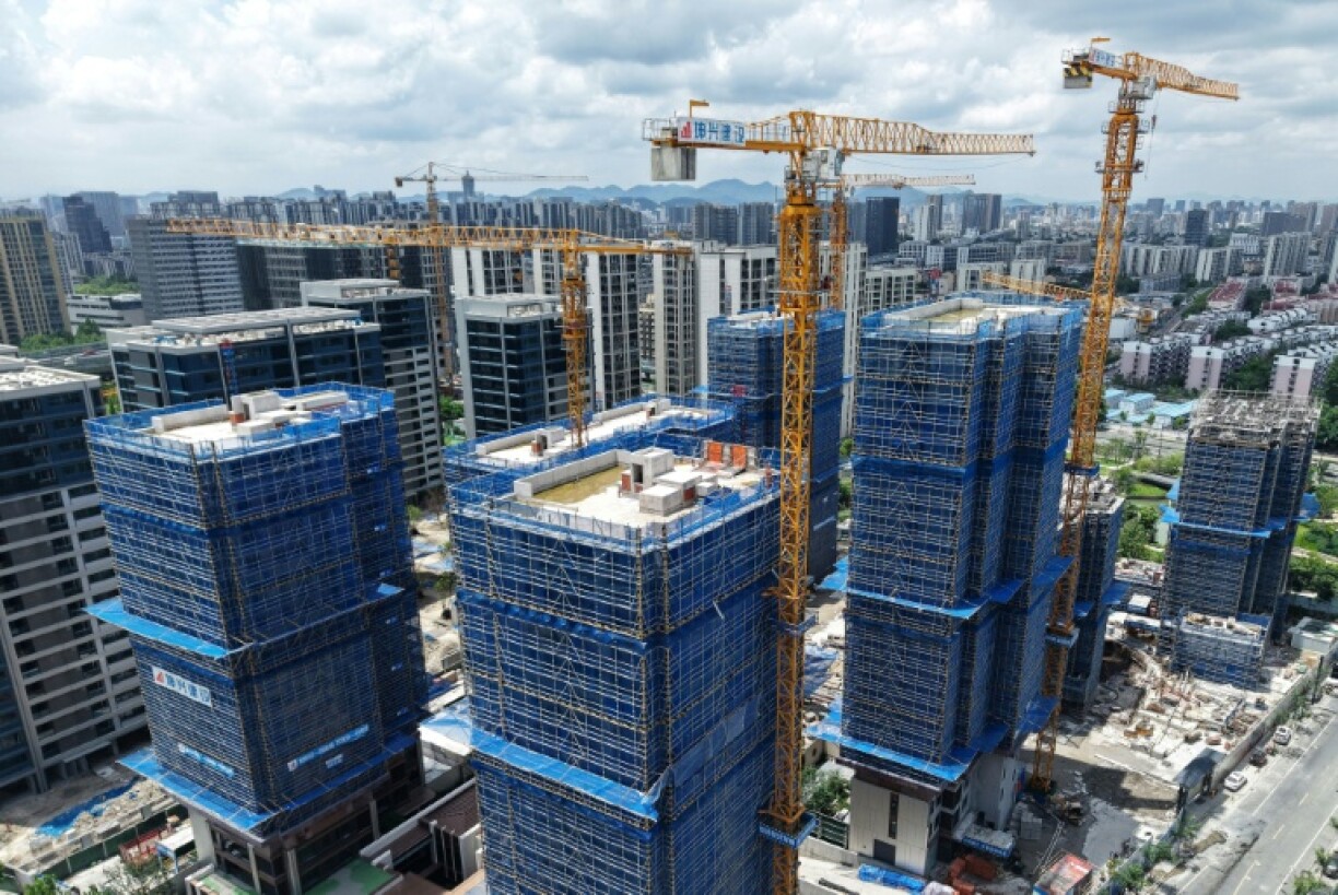 Buildings under construction in Hangzhou, in China’s eastern Zhejiang province. Beijing has struggled to fully reignite the world's number two economy since the end of the Covid-19 pandemic, with the once-booming property sector mired in a debt crisis and exports facing mounting headwinds