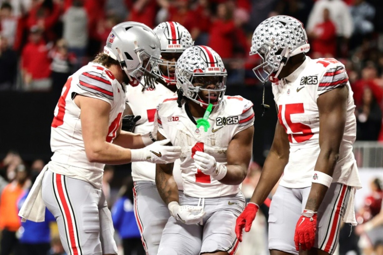 Quinshon Judkins of the Ohio State Buckeyes celebrates a touchdown during the team's victory over Notre dame in the US college football national championship game