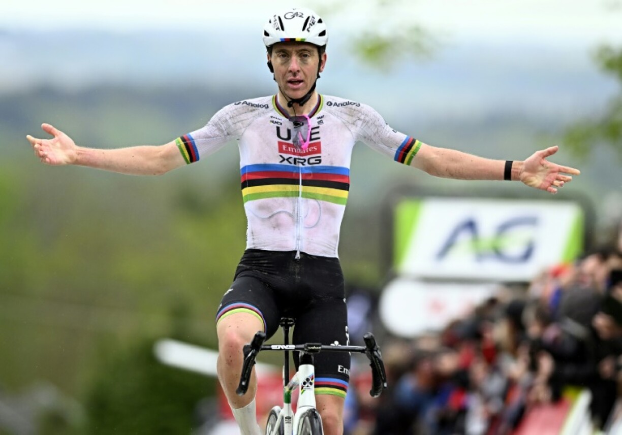 Tadej Pogacar celebrates his victory in the Fleche Wallonne