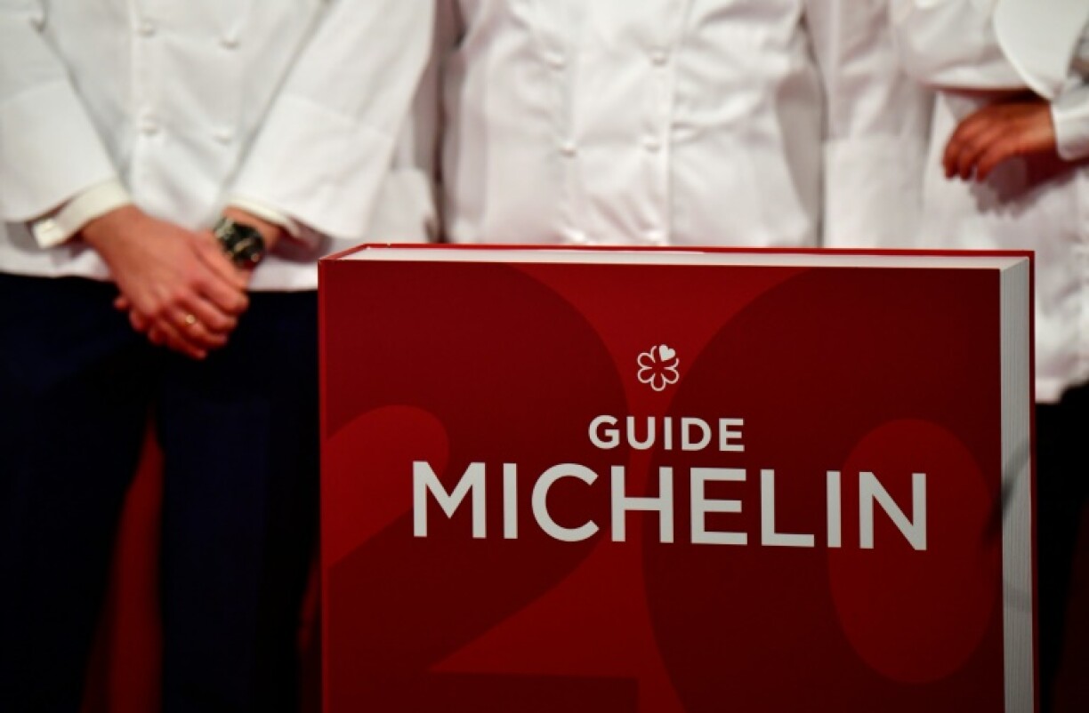 Le célèbre guide gastronomique Michelin, qui a retiré sa troisième étoile au restaurant Paul Bocuse, connaît le succès depuis plus d'un siècle mais a aussi suscité des polémiques