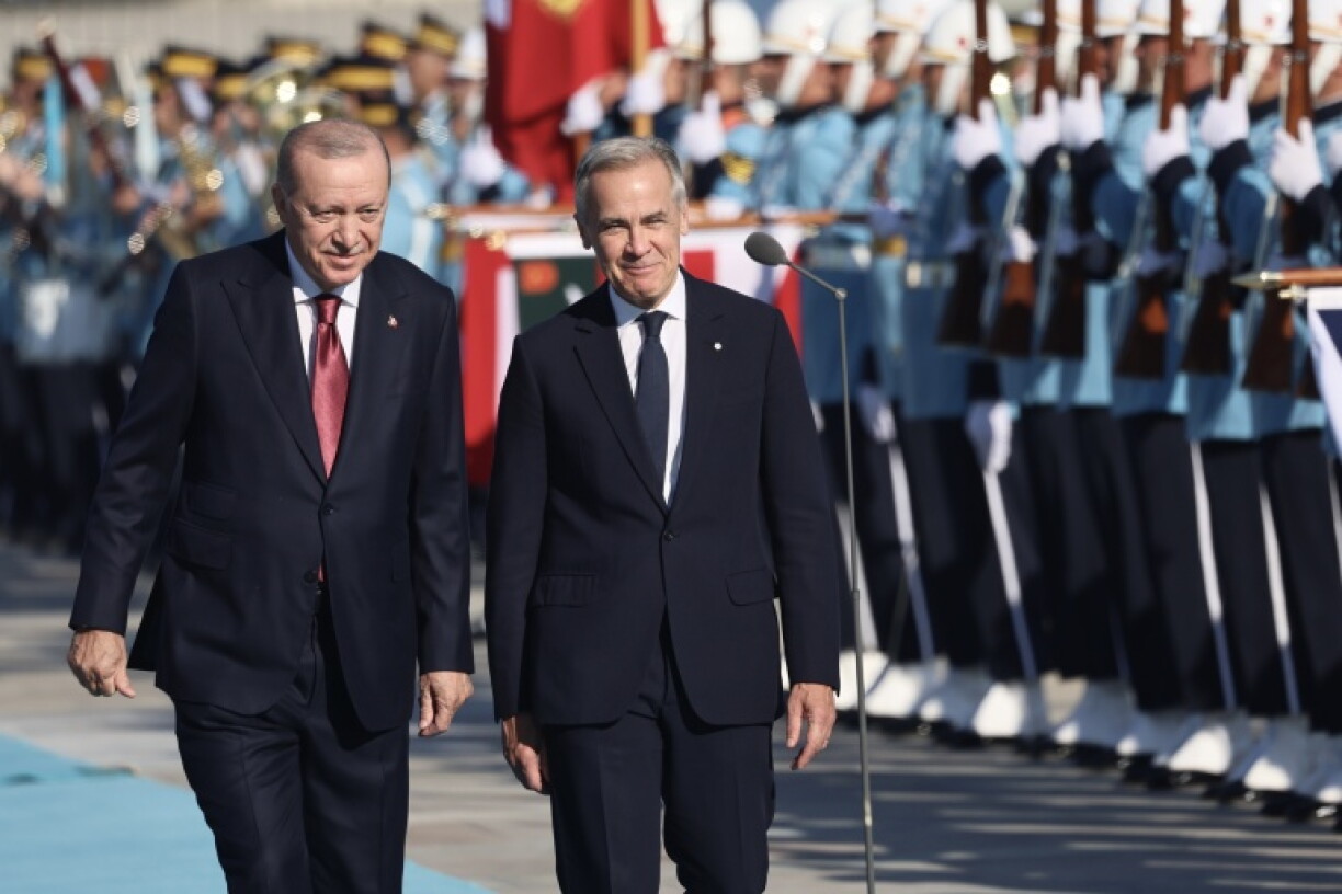 Canadian Prime Minister Mark Carney (right) and Turkey's President Recip Erdogan staged a joint news conference in Ankara