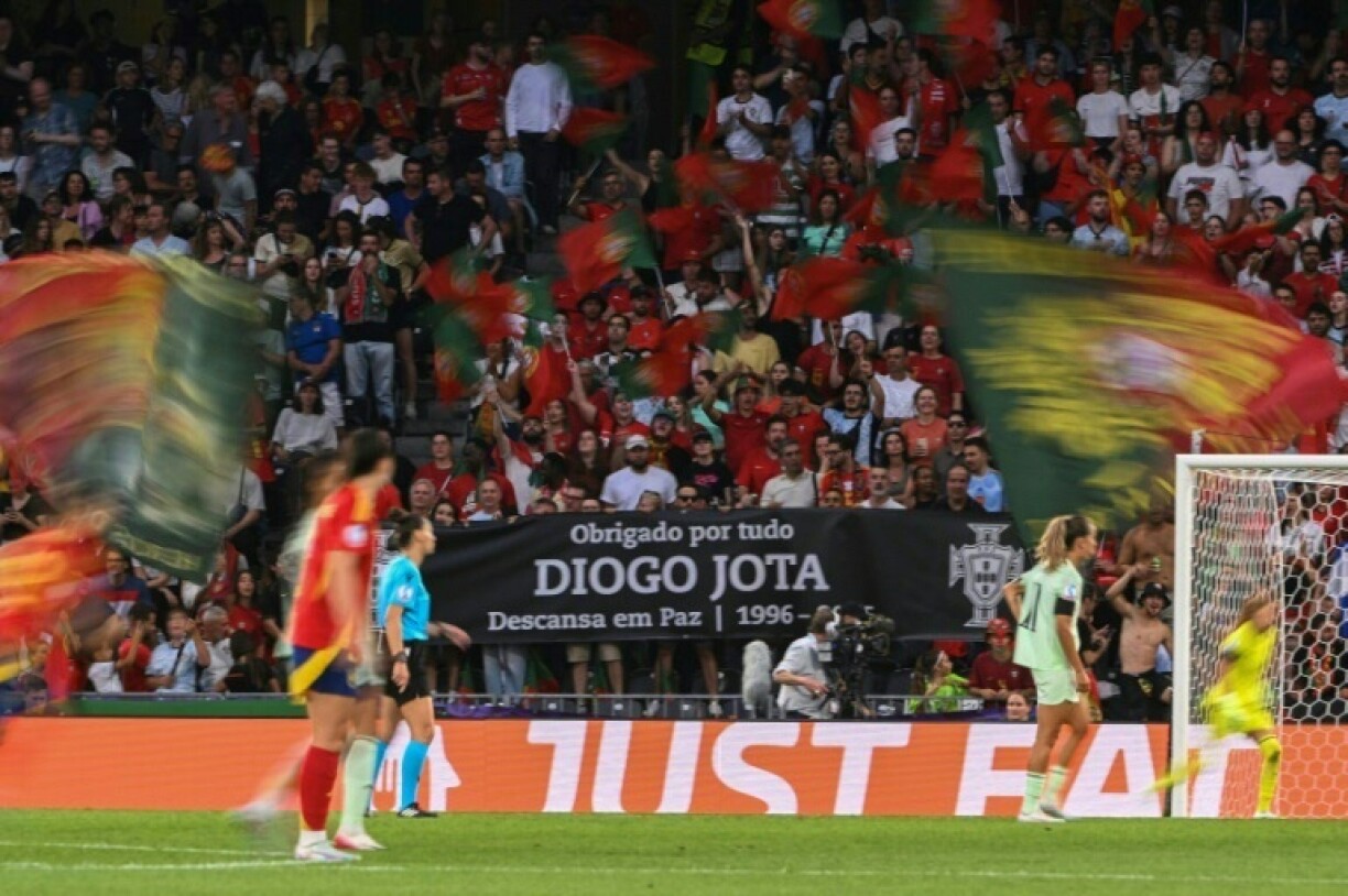 Portugal fans pay tribute to Liverpool'q Portuguese forward Diogo Jota who was killed in a car crash in Spain