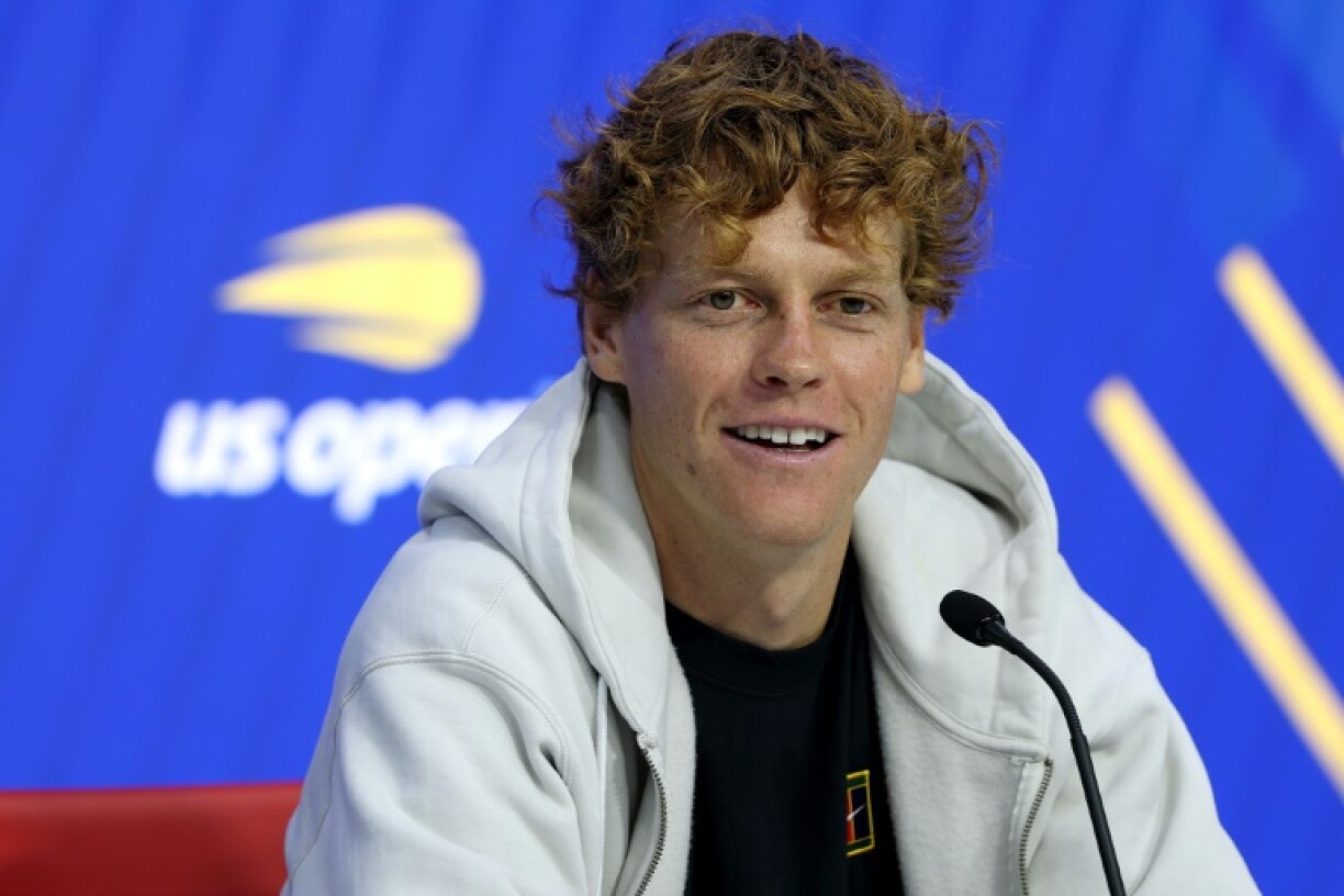 Defending champion Jannik Sinner talks to reporters ahead of the US Open at the Billie Jean King National Tennis Center in Flushing Meadows