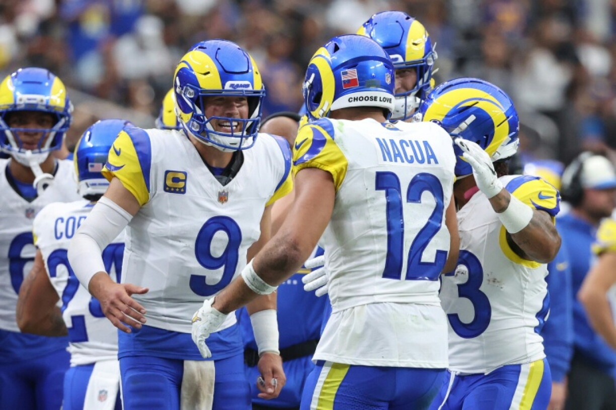 Los Angeles Rams quarterback Matthew Stafford celebrates a touchdown with teammate Puka Nacua in the Rams' NFL victory over the Las Vegas Raiders