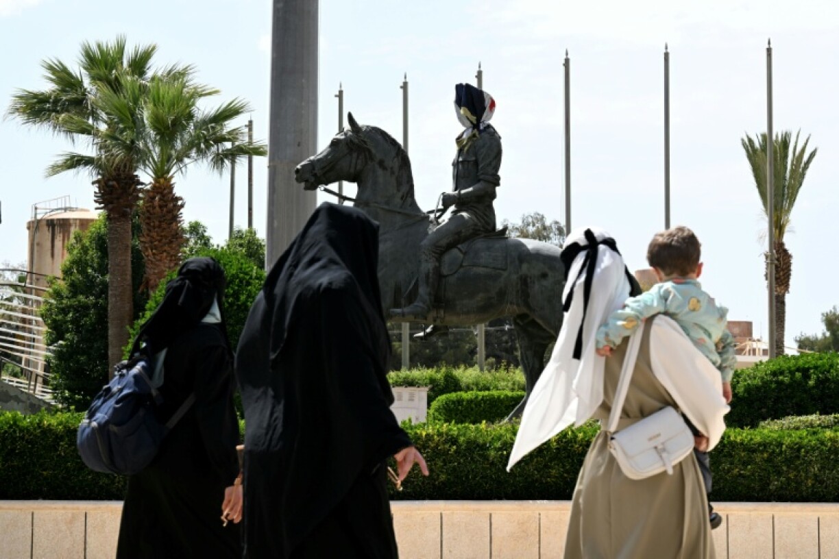 A statue of ousted president Bashar al-Assad's late brother, Bassel, still stands outside the Dimas equestrian club near Damascus
