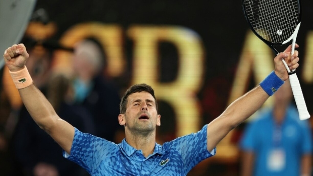 Le Serbe Novak Djokovic exulte après sa victoire sur le Bulgare Grigor Dimitrov à l'Open d'Australie, le 21 janvier 2023