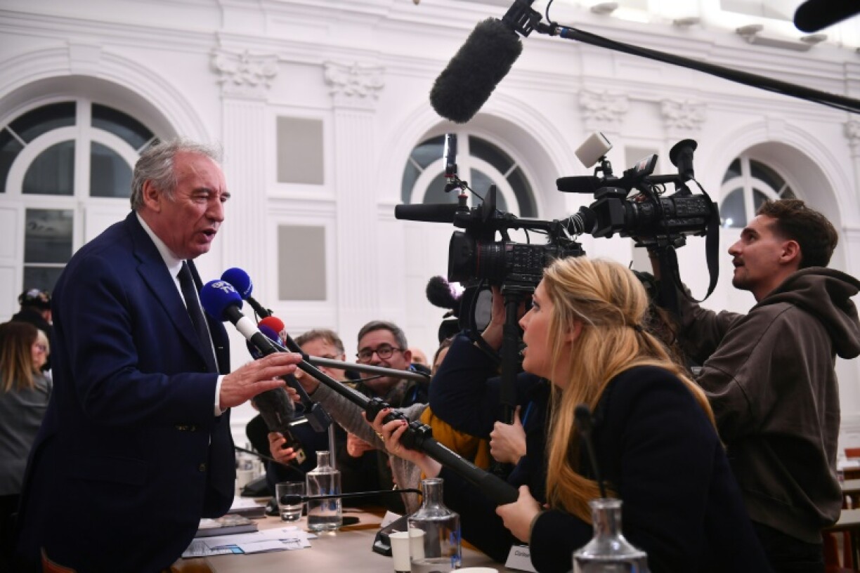 Newly appointed France's Prime Minister and mayor of Pau Francois Bayrou addresses media at the end of the municipal council at the town hall in Pau, southwestern France on December 16, 2024