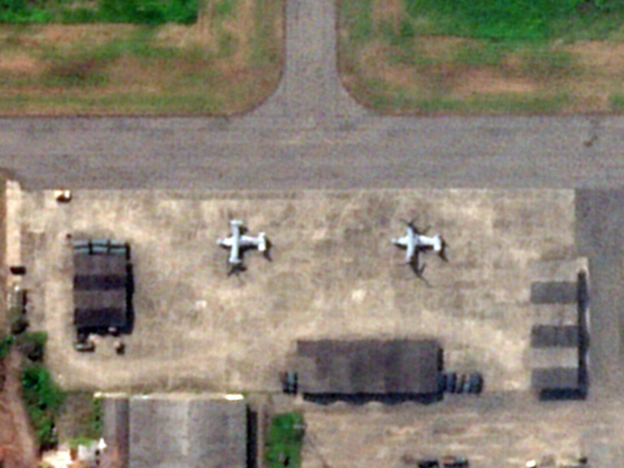 This handout satellite image captured by Planet Labs PBC on October 10, 2026, and analysed by AFP, shows two aircraft on the tarmac whose dimensions and shape are consistent with V-22 Ospreys, at the Ecuadorean military air base of Taura