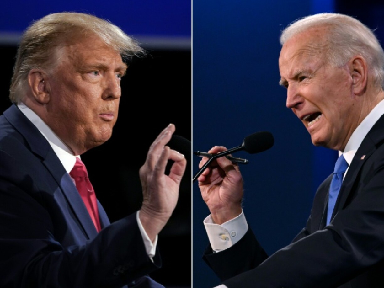 Combinaison de photos créée le 22 octobre 2020: l'ancien président américain Donald Trump (G) et l'actuel président américain Joe Biden alors candidats lors du dernier débat présidentiel à Nashville, aux Etats-Unis, le 22 octobre 2020