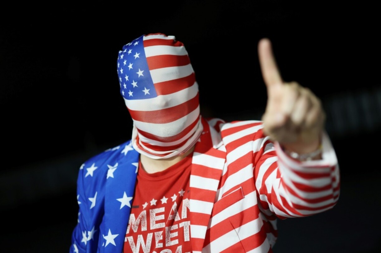 A United States supporter wears his loyalty on his sleeve, and everywhere else, on the opening morning of the 45th Ryder Cup