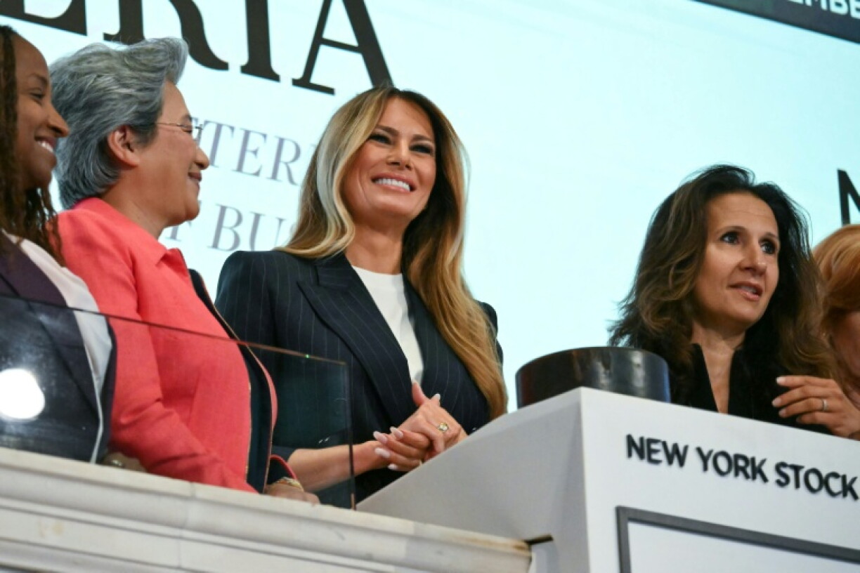 US First Lady Melania Trump, alongside NYSE Group President Lynn Martin (R) and President and CEO of Advanced Micro Devices Lisa Su (L), rang the opening bell of the New York Stock Exchange earlier this week