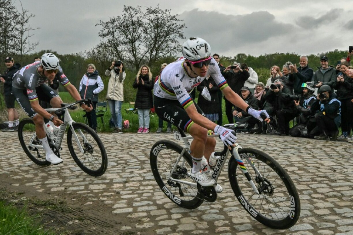 Mathieu van der Poel (L) won his third Paris-Roubaix title on Sunday
