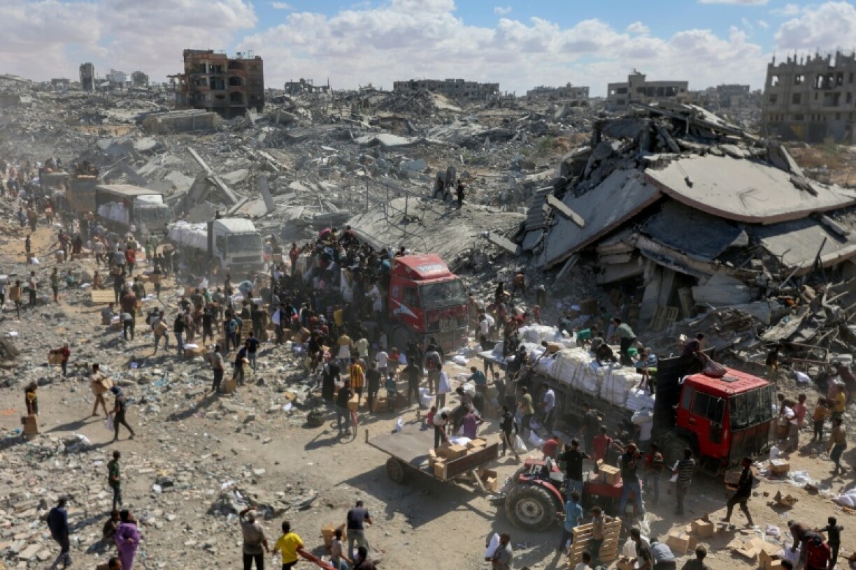 Aid trucks surrounded by desperate Palestinians in Gaza on October 12