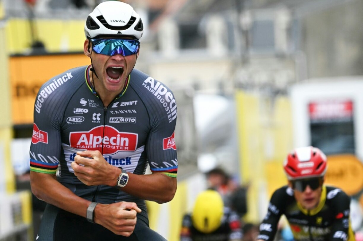 Alpecin - Deceuninck team's Dutch rider Mathieu van der Poel cycles to the finish line to win the 2nd stage of the Tour de France