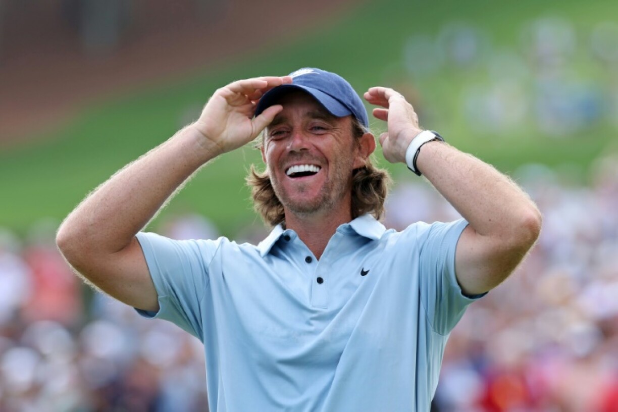 England's Tommy Fleetwood celebrates his first US PGA Tour triumph at the Tour Championship in Atlanta, Georgia