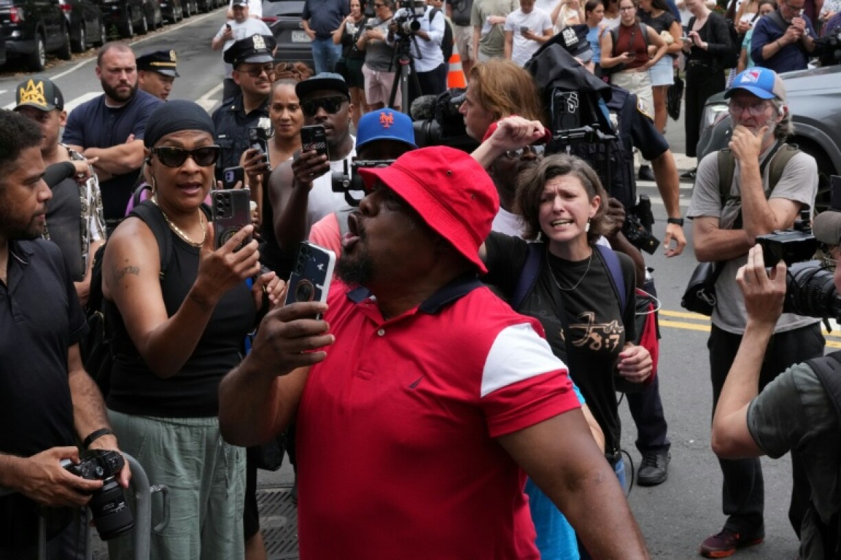 People in support and against the verdict in Sean 'Diddy' Combs's sex trafficking trial gather outside Manhattan's Federal Court