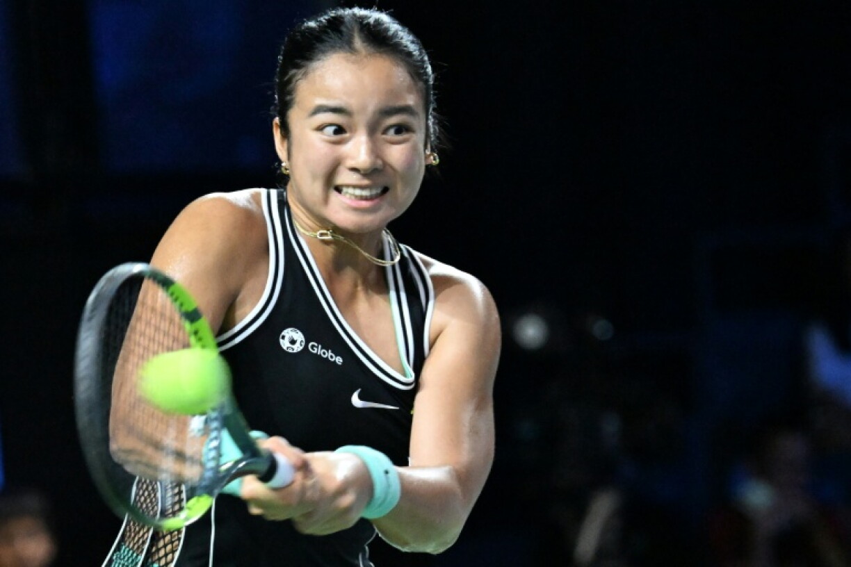 Philippines Alexandra Eala hits a return against Russia's Tatiana Prozorova during the WTA Singapore Open Tennis round 16 in Singapore on September 24, 2026.