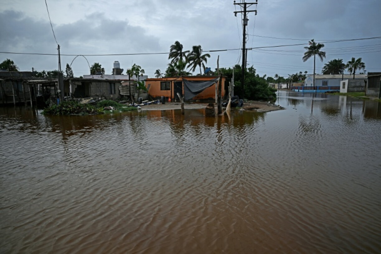 Hurricane Polo flooded streets in the Mexican town of Puerto San Carlos, on Baja California peninsula, but did not create the devastation some residents had feared