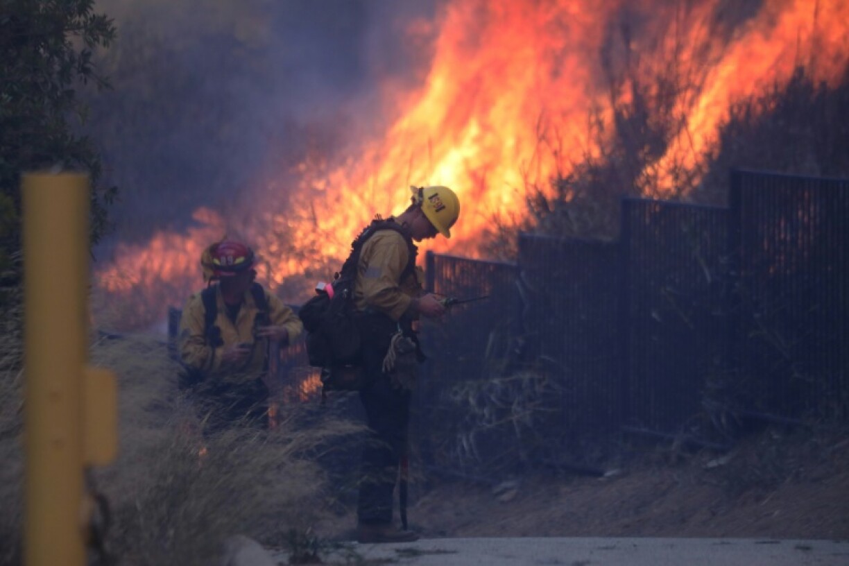 Strong winds are fanning the flames, sparking new blazes faster than firefighters in California can put them out