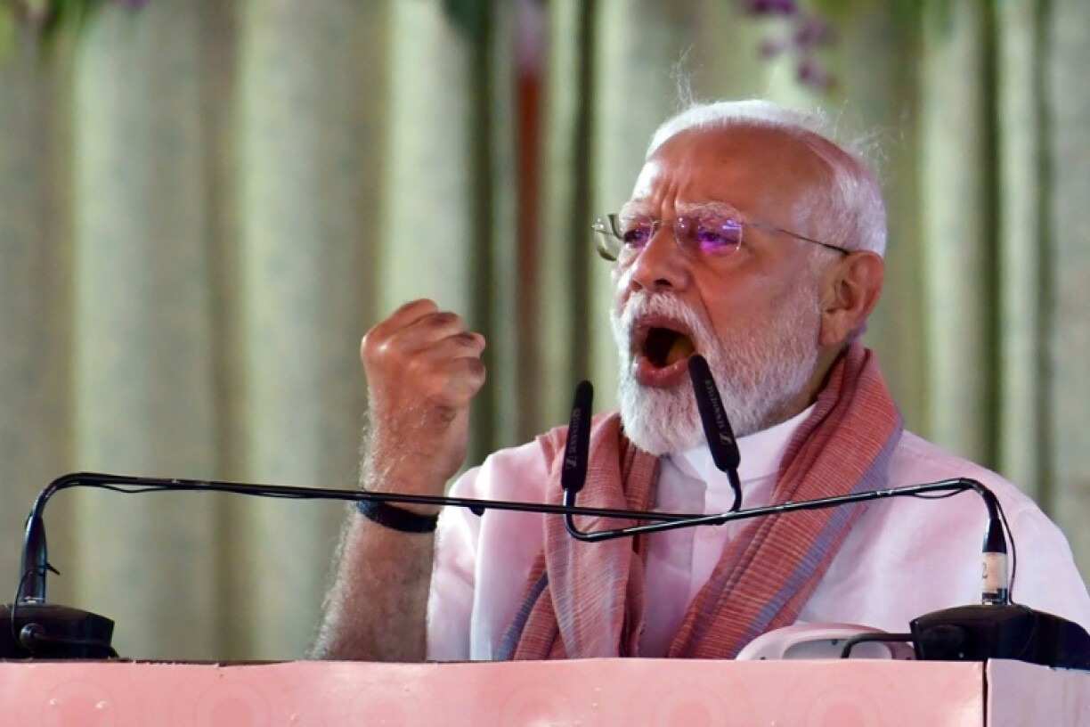 India's Prime Minister Narendra Modi vowed to hunt down the gunmen responsible for killing 26 men