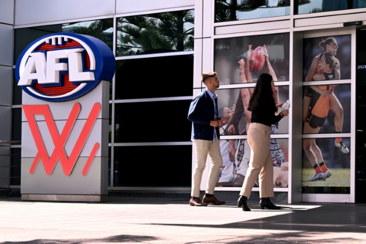 People enter Australian Football League (AFL) House in Melbourne in March 2024