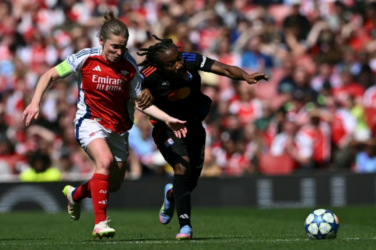 Lyon midfielder Melchie Dumornay (R) scored against Arsenal in the Women's Champions League