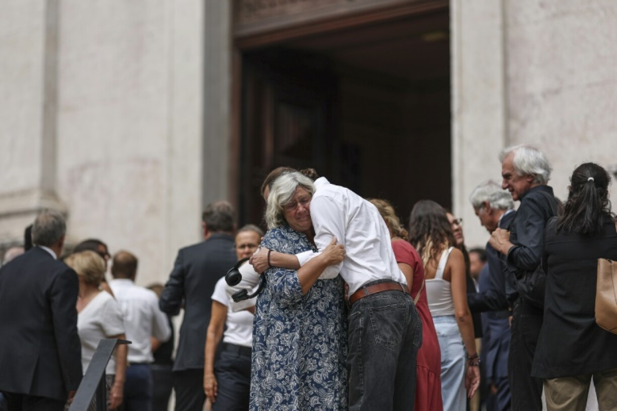 Relatives and colleagues of the four Portuguese victims who worked for the same charity attended a memorial mass Friday