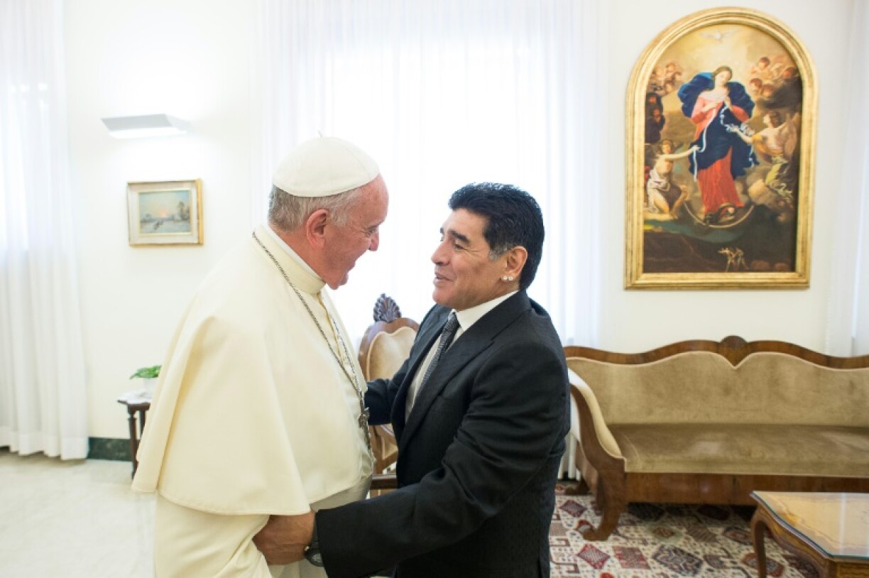 Pope Francis greets Argentina great Diego Maradona at the Vatican in 2014